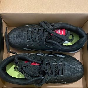 Baseball cleats. New in box size 13